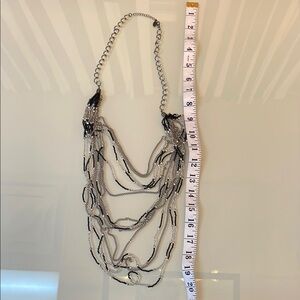 Silver and Black Multi-Strand Necklace with Cascading Design